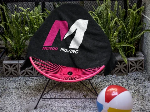 beach towel template on a pink acapulco chair near plants a14897 480x480